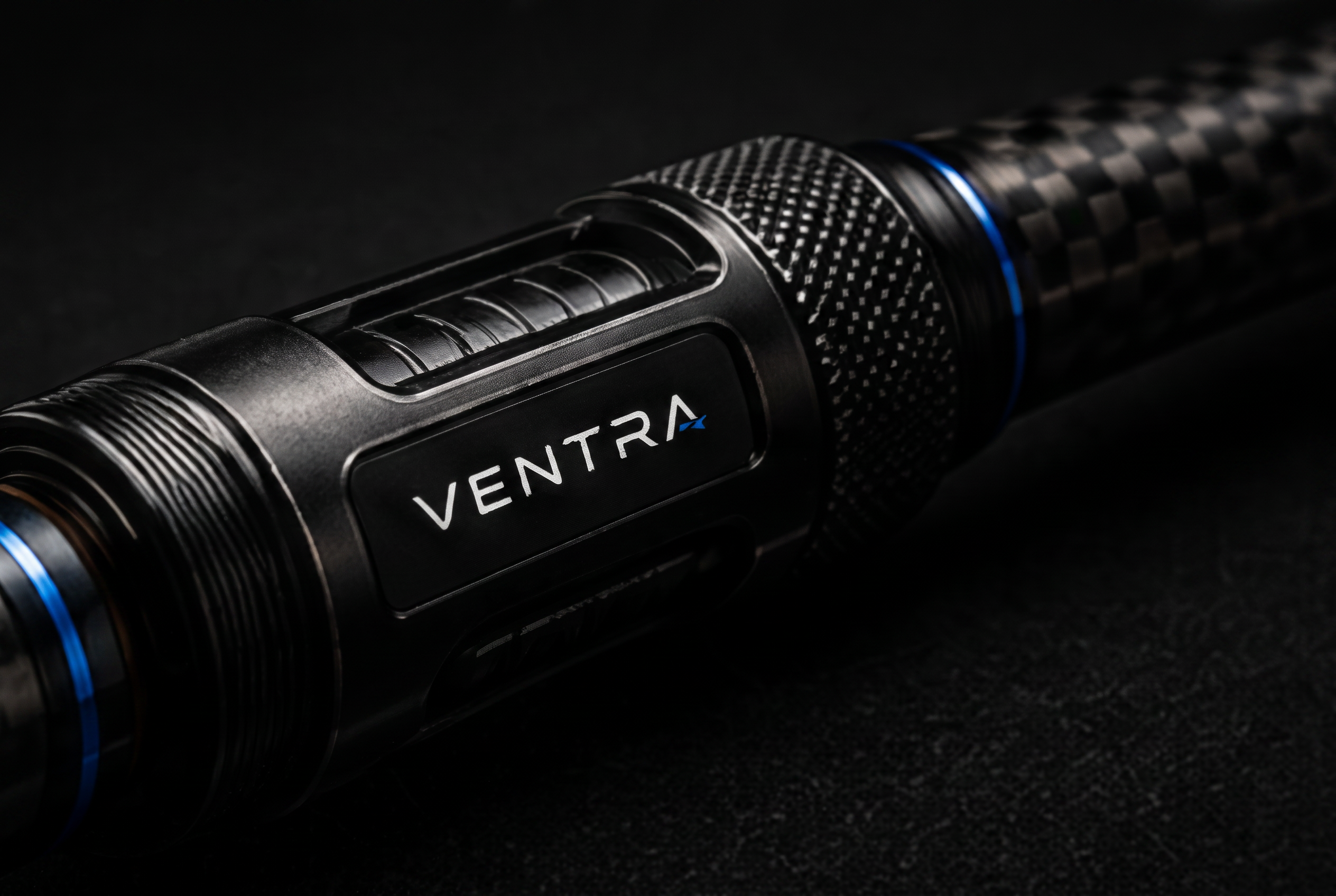 Machined reel seat with knurled locking nut and blue trim ring