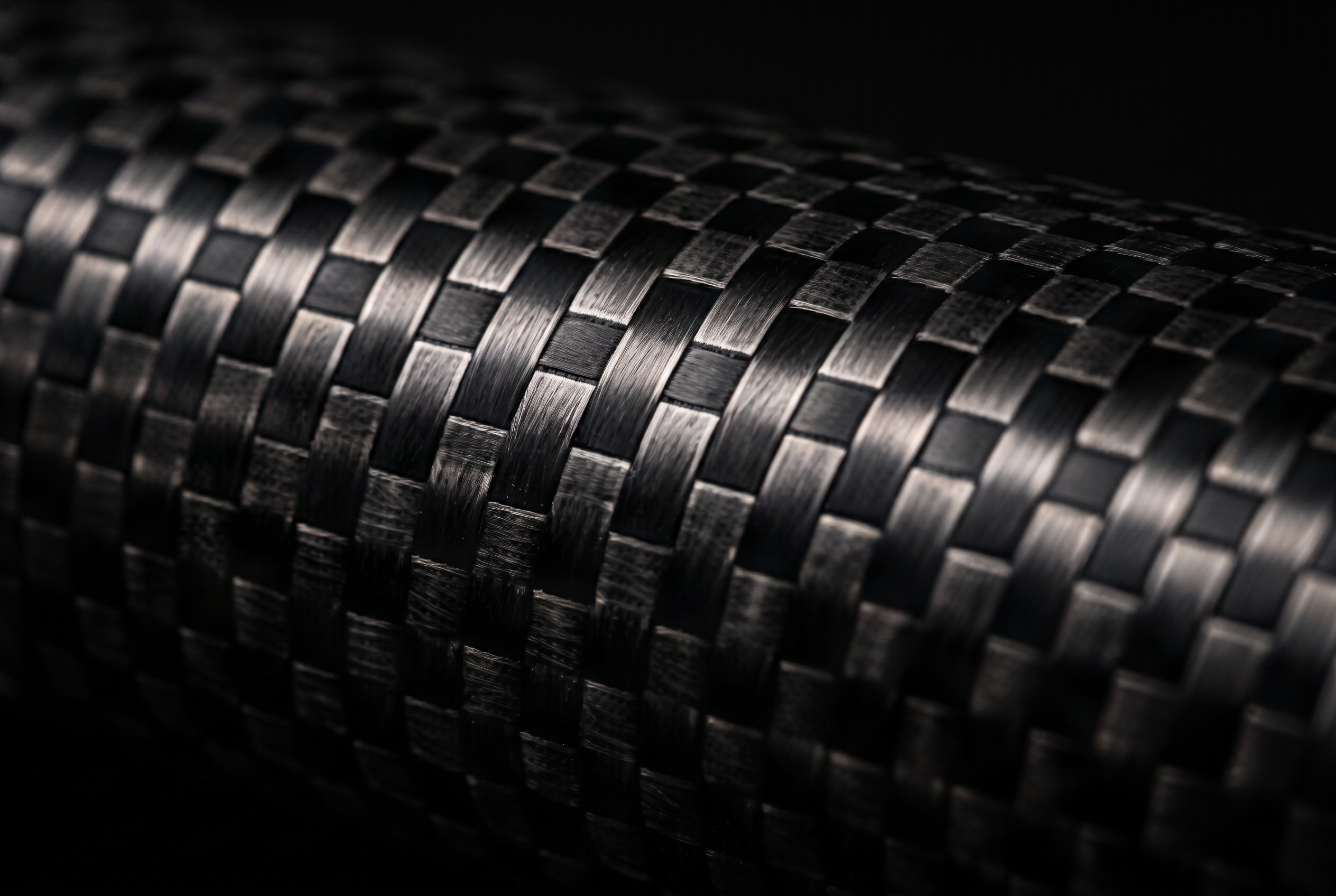 Close-up of the woven carbon wall of a telescopic rod section